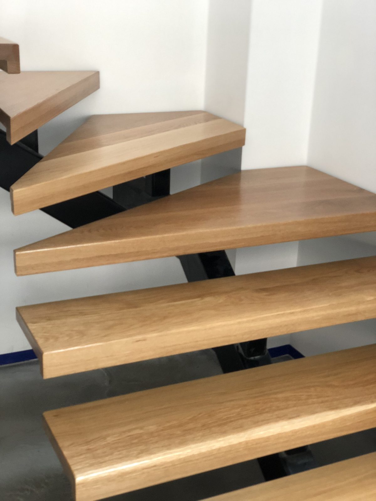 Solid treads supplied and installed to steel spine by Timber Floors Pty Ltd