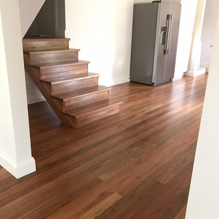 Spotted Gum timber flooring and stair treads supplied and installed by Timber Floors Pty Ltd